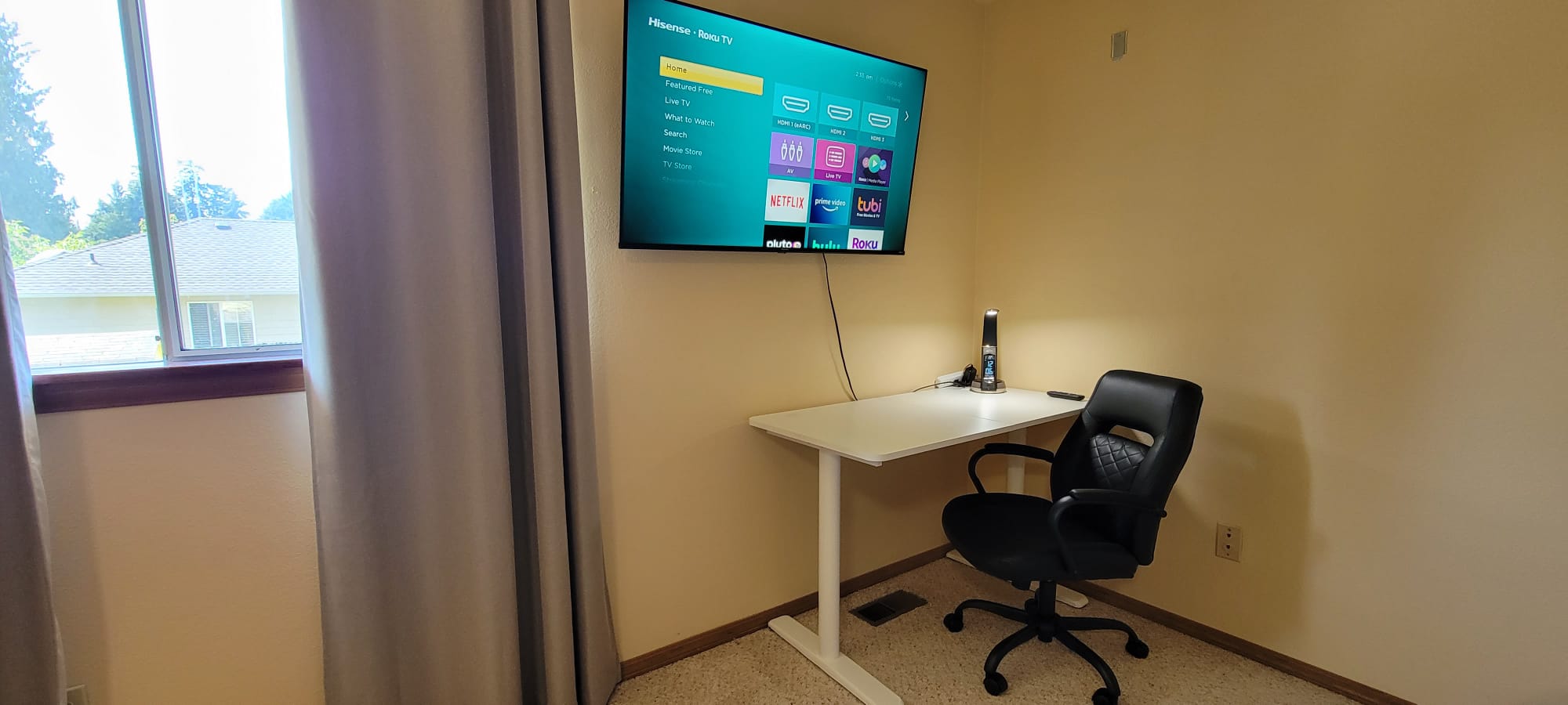 Dedicated work space with quality office chair and 4k Smart TV
