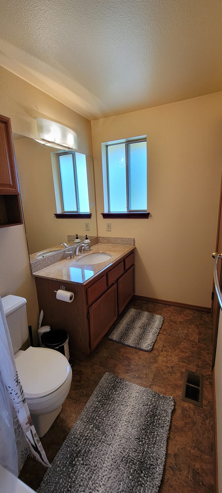 Full private bathroom sink and mirror