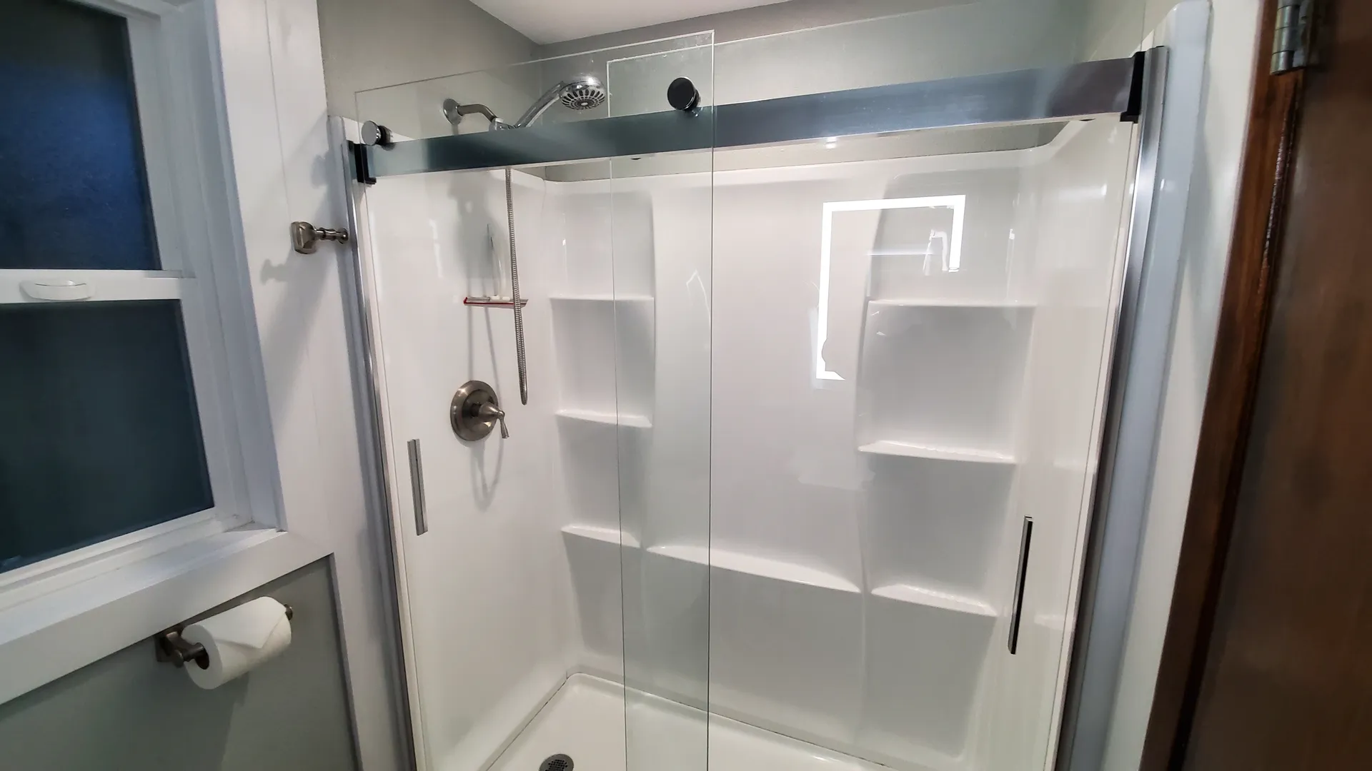 Modern 5 ft shower with sliding glass door