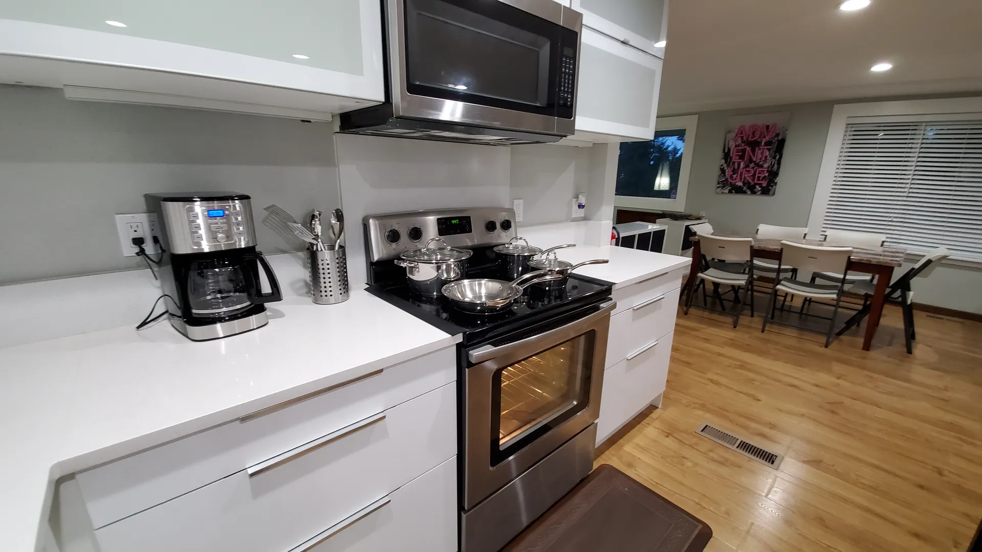 Modern kitchen with new appliances and utensils