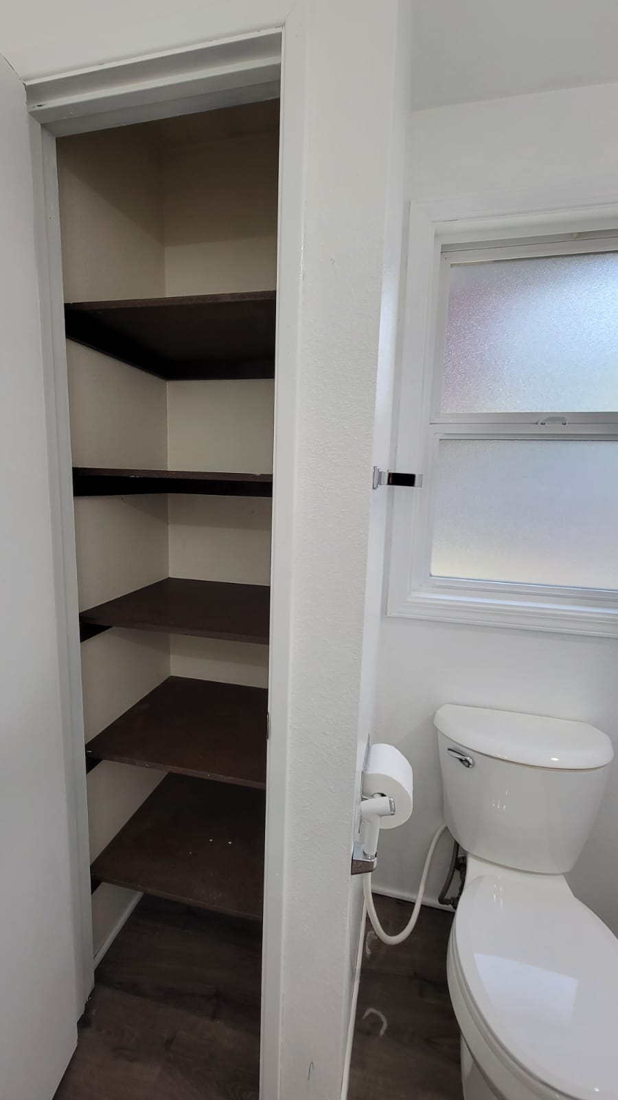 Private bathroom closet and toilet with bidet