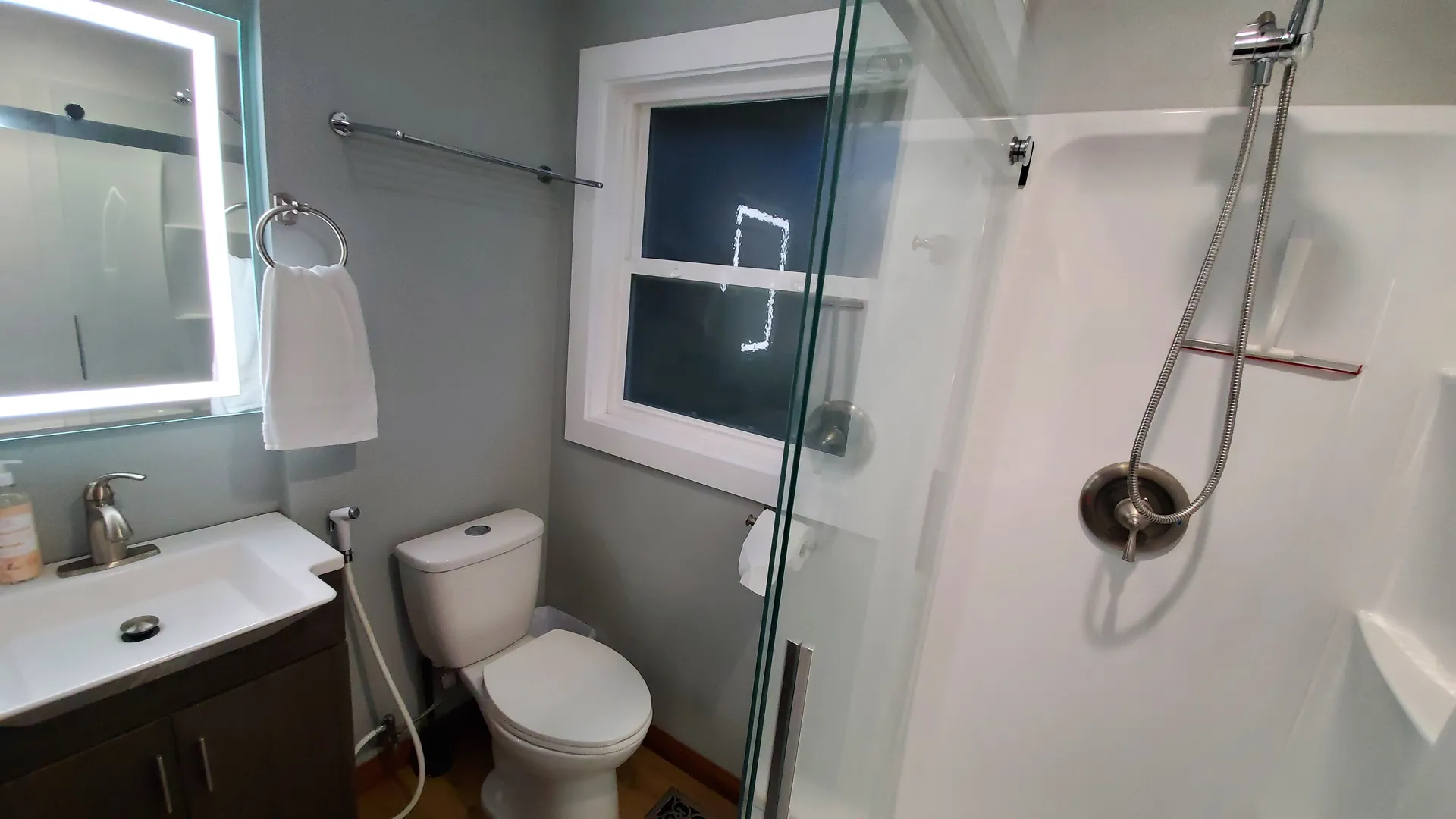 Spacious bathroom 1 with natural light