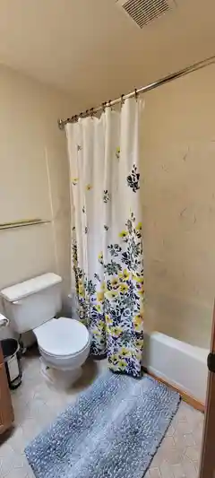 Upper floor bathroom with bathtub